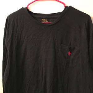 Polo Long sleeved black shirt with front pocket.